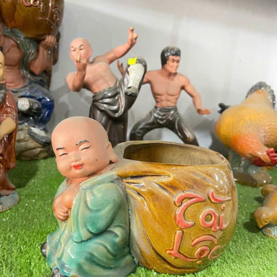 CHẬU TƯỢNG CHÚ TIỂU KÉO TÚI TÀI LỘC